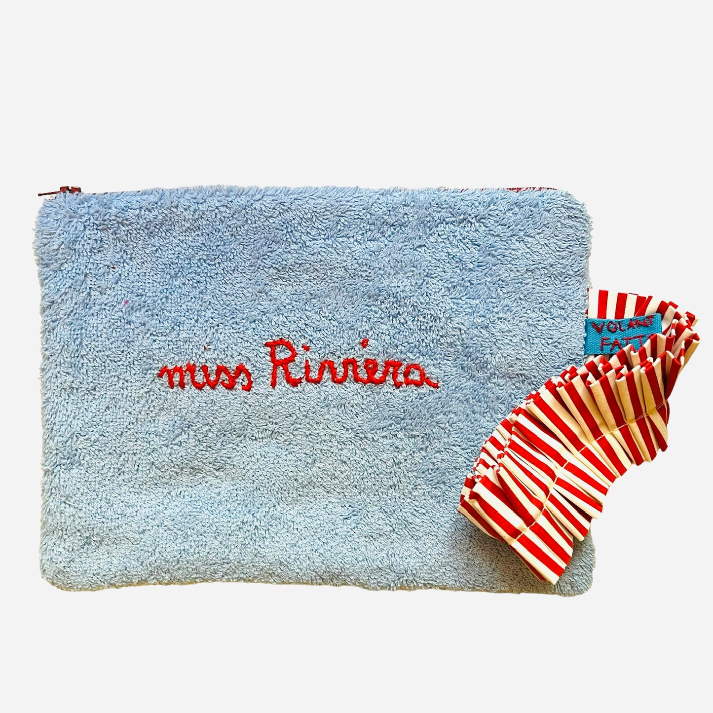Busta pochette in spugna celeste ricamata a mano “miss Riviera”